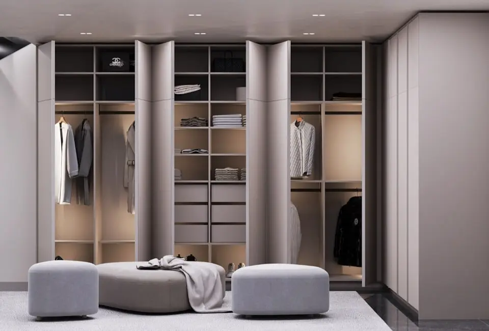 walk-in wardrobe with island dresser and hanging space